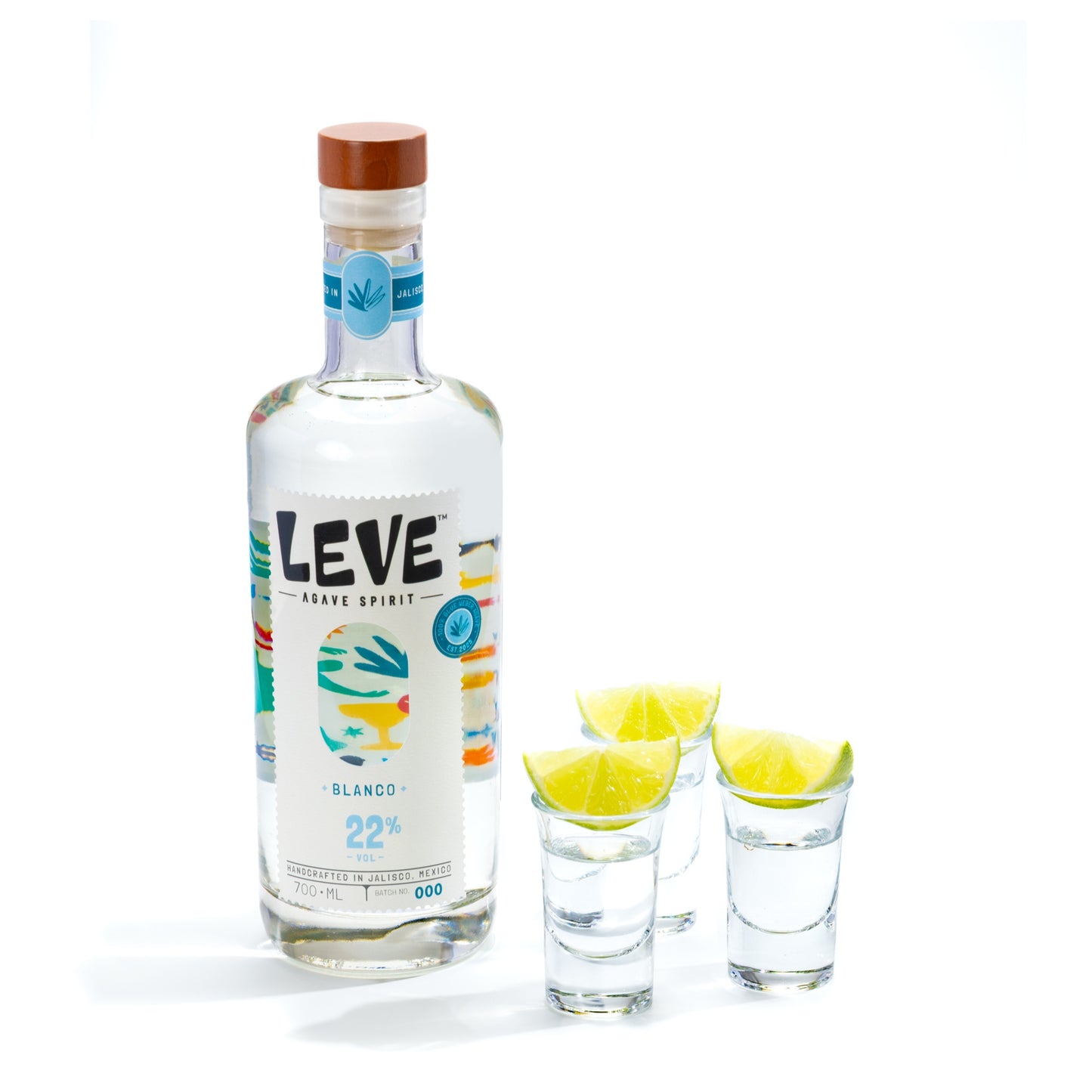 Bottle of Leve Blanco with a three shots