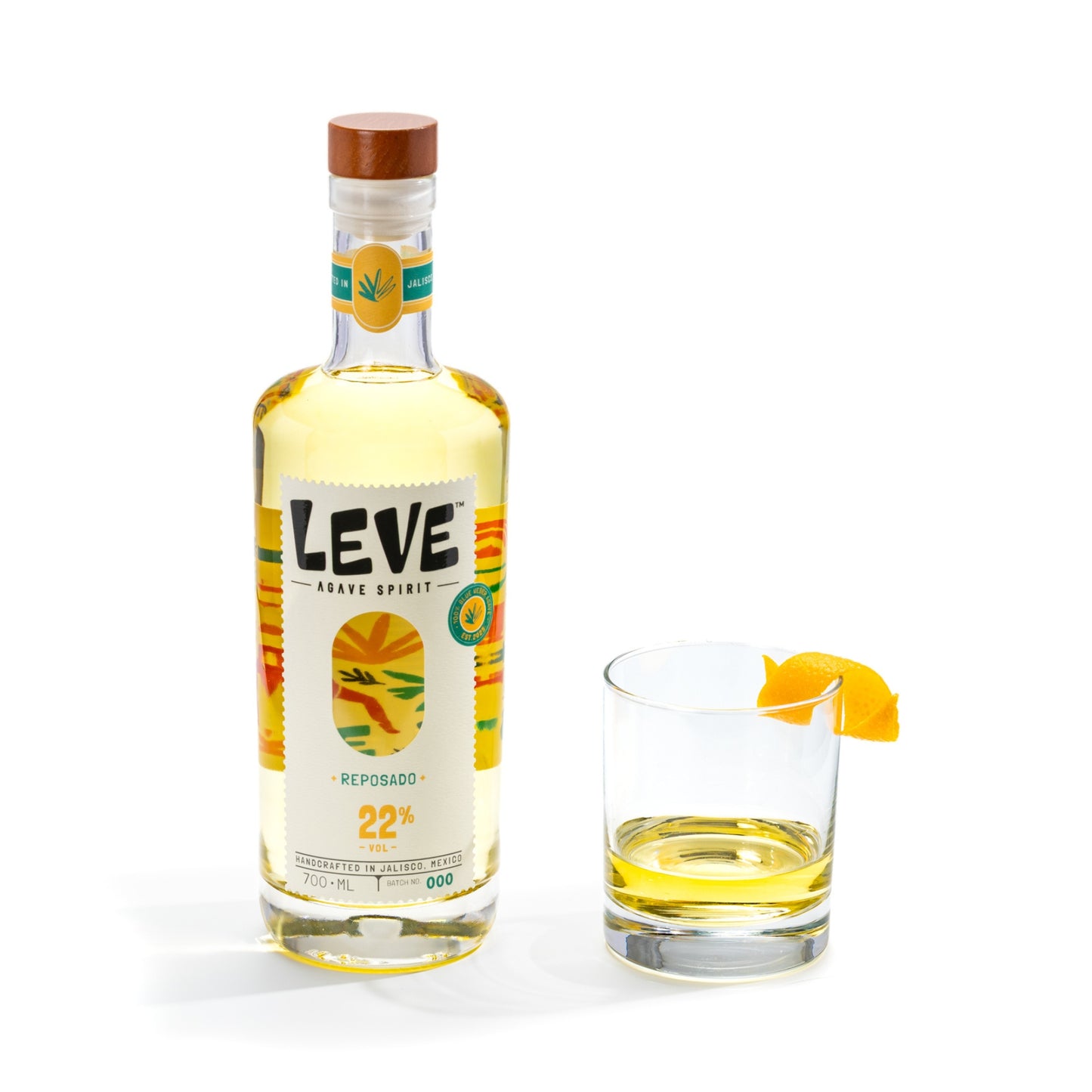 Bottle of Leve Reposado with a neat pour